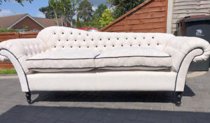 Buttoned sofa recovered with new feather/fibre filled cushions