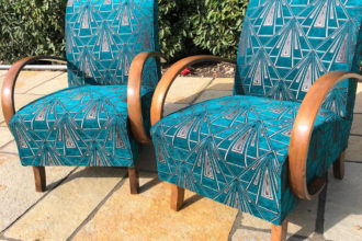 A pair of old Art Deco style chairs reupholstered and recovered