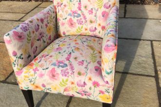 An old Edwardian chair recovered in a Clarke & Clarke print