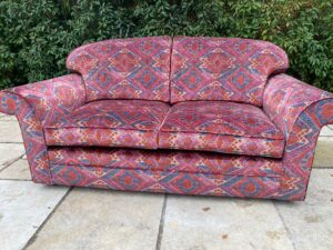 Reupholstered 2 seater settee re-covered in Linwood fabrics