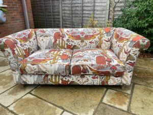 2 seater settee recovered in a Clarke and Clarke print