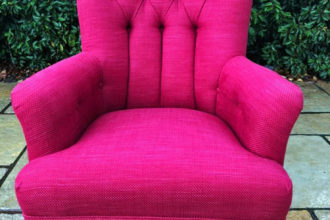 Before and after of a button back chair, recovered in a Laura Ashley fabric