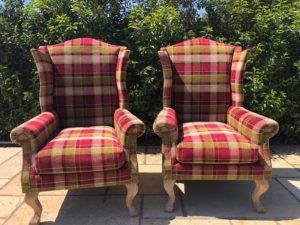 A pair of old wing back chairs recovered and reupholstered - Fordingbridge