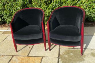 A pair of old chair frames re-polished and totally reupholstered and recovered in black velvet
