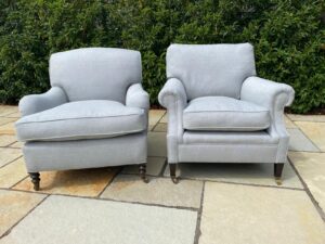 A pair of George Smith chairs recovered with new feather cushions