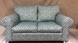 Collins and Hayes settee covered in client's own fabric