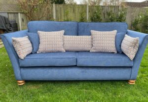 3 seater settee recovered in fabric from Fryetts