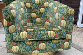 Large tub chair recovered in a vibrant Baker velvet print with a new brass base