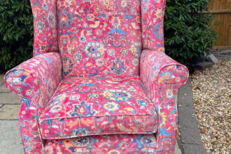 Large wing chair recovered in Linwood velvet