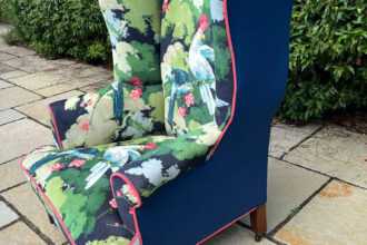 Large wing chair recovered in Linwood printed velvet
