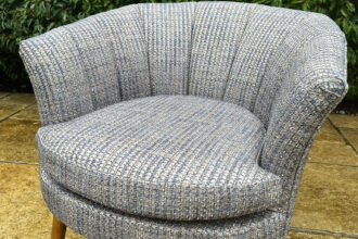 Modern occasional chair recovered in Jab fabric