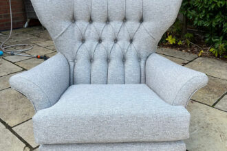 Vintage G plan swivel rocker recovered in grey weave