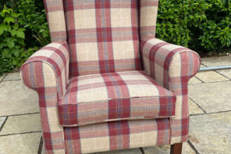 Wing chair covered in client's choice of fabric
